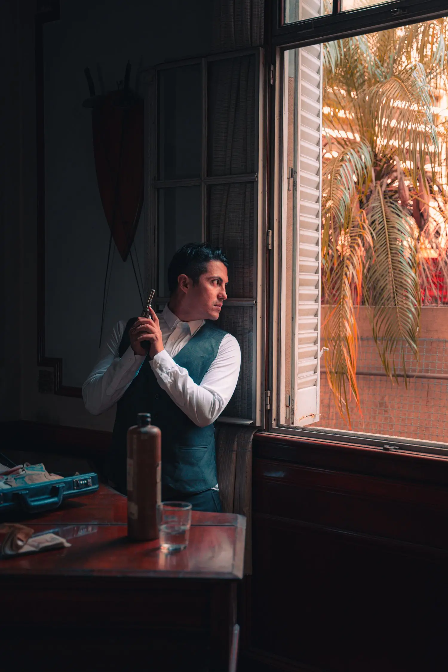 Tense shadowed portrait with elegant formal styling