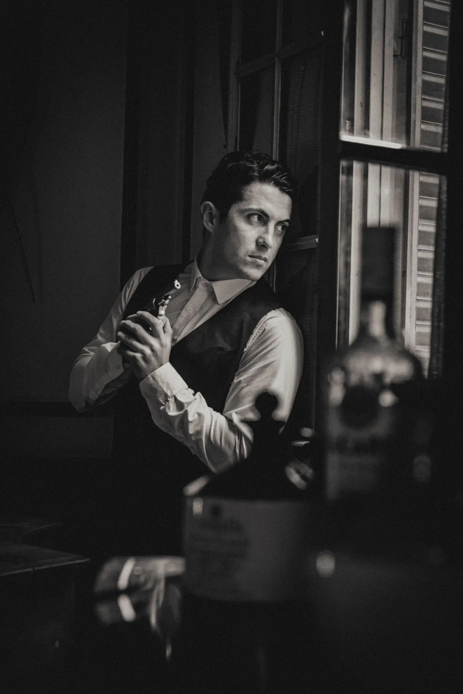 Intense formal portrait with strong side lighting