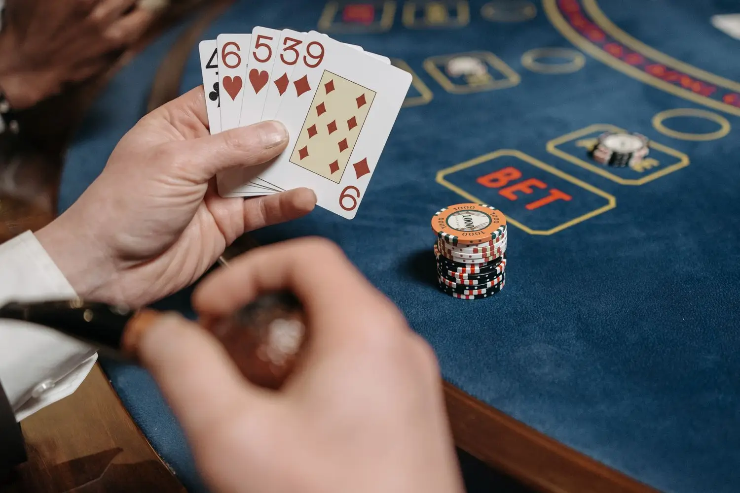 Cards and chips on a cinematic table